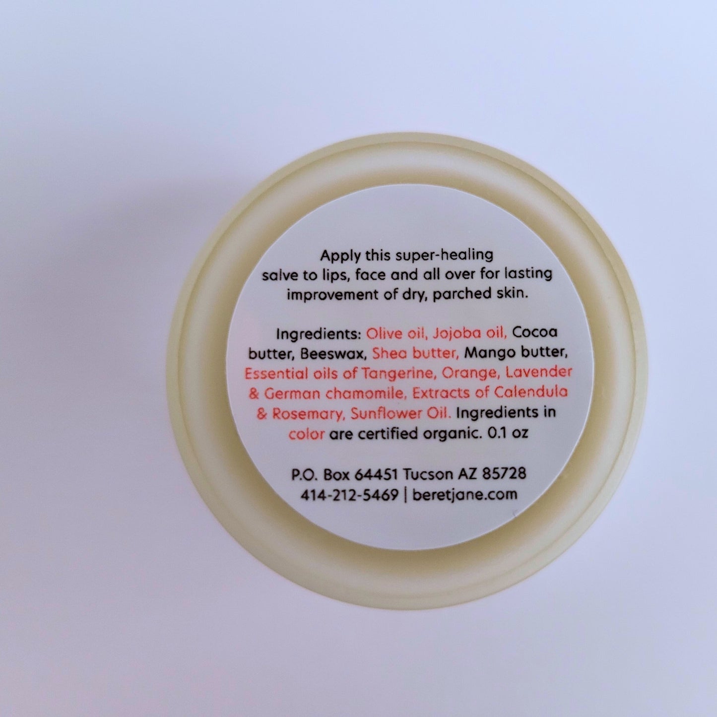 Ingredients printed on the bottom of the Beret Jane Miracle Salve small jar