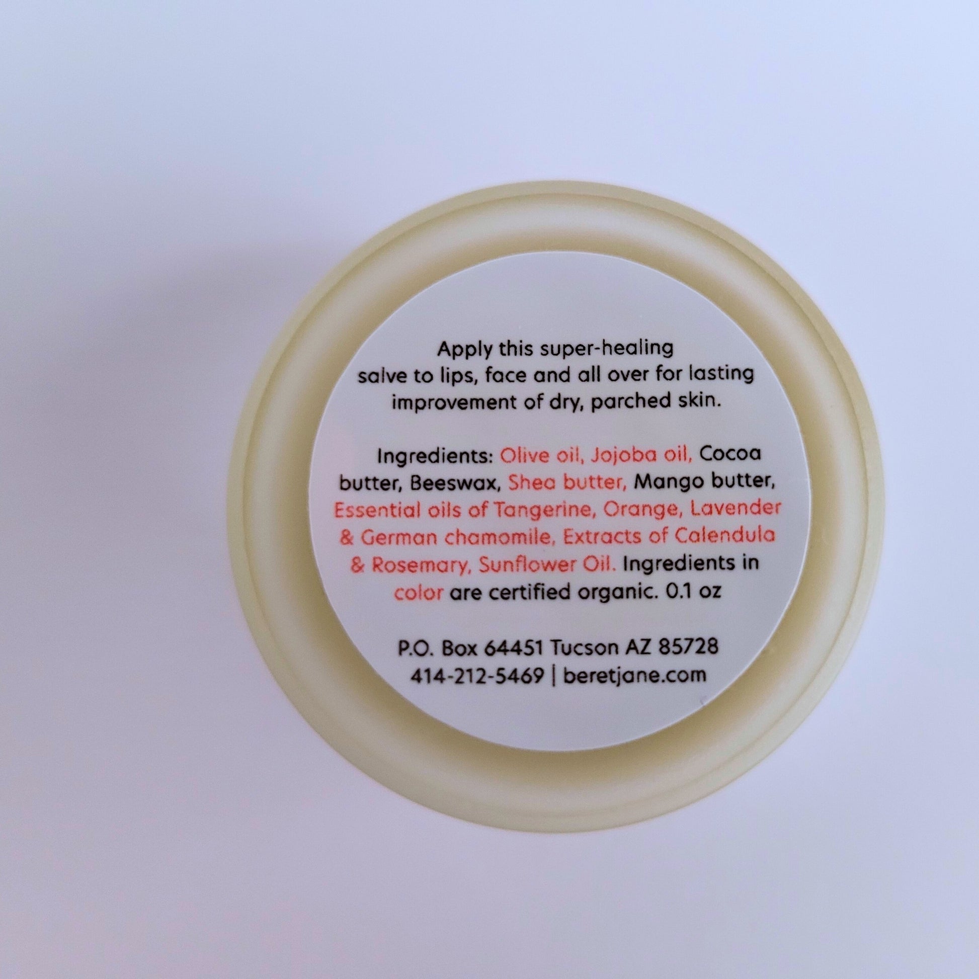Ingredients printed on the bottom of the Beret Jane Miracle Salve small jar